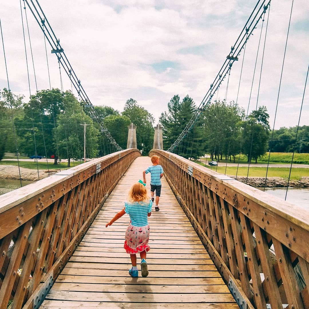kids running a bridge