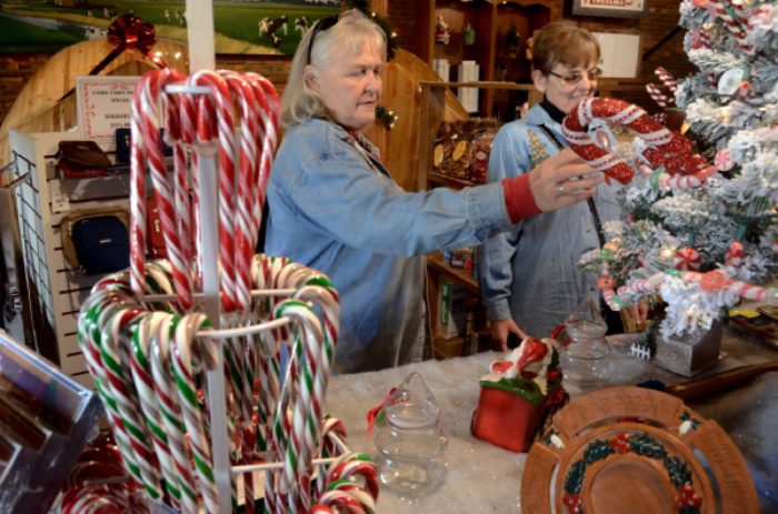 people shopping at candy canes on main in casey illinois