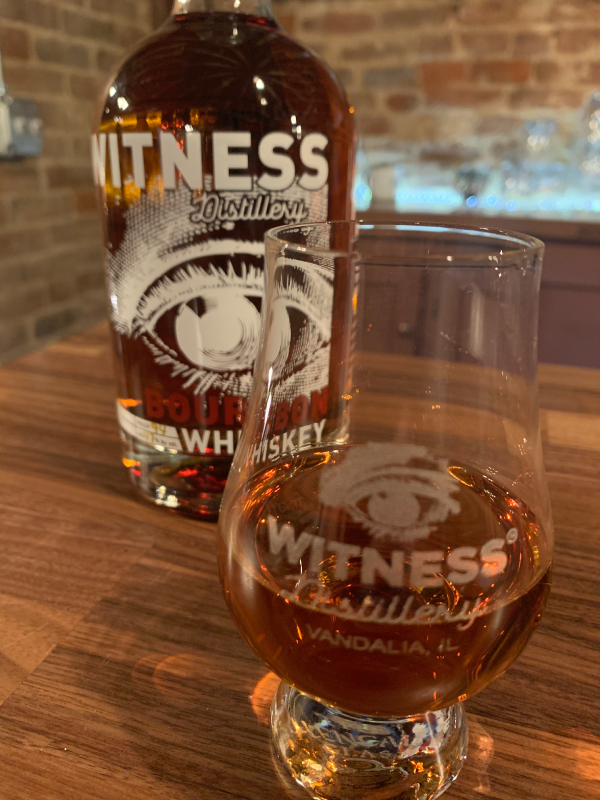glass of whiskey from witness distillery in vandalia illinois